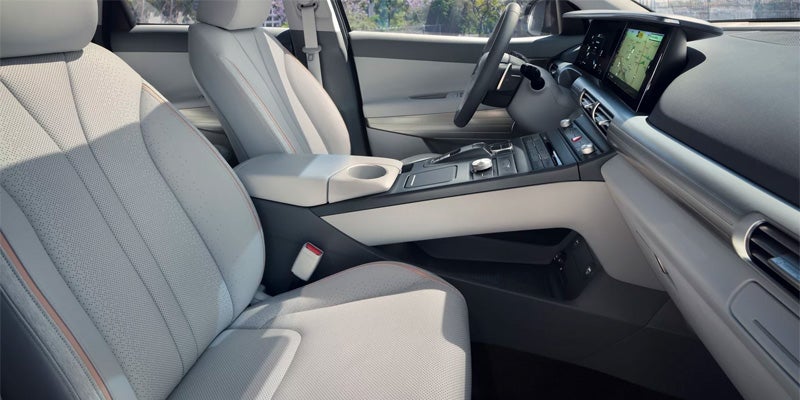 Interior view of Hyundai Nexo showing front seats, center console, and infotainment system.