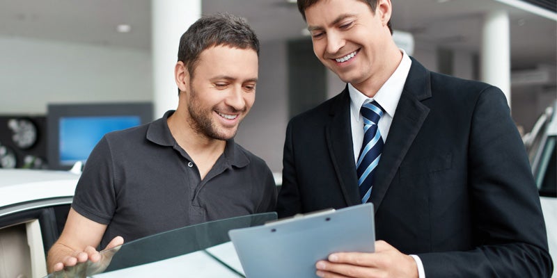 Bentley Hyundai in Huntsville AL sales rep explaining financing to a customer