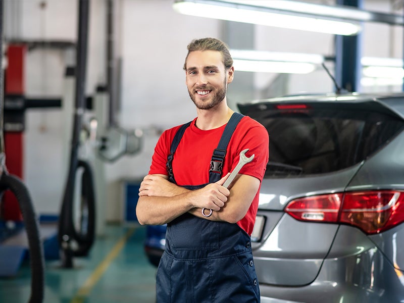 Bentley Hyundai in Huntsville AL technician in a garage holding a wrench