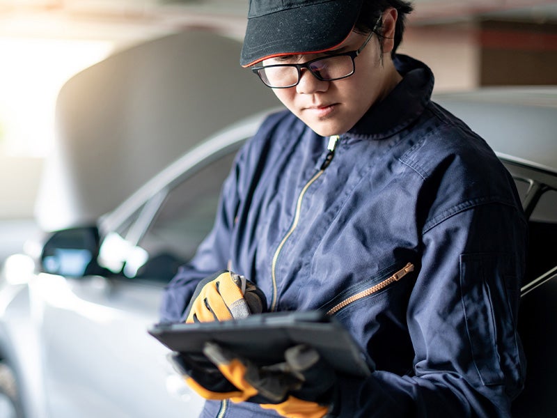 Bentley Hyundai in Huntsville AL technician looking at an ipad